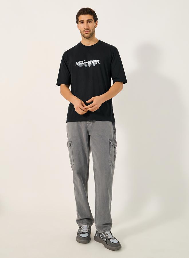 ستايلي تي شيرت أوفر سايز بطبعة تايبوجرافي وأكمام قصيرة - Image 2